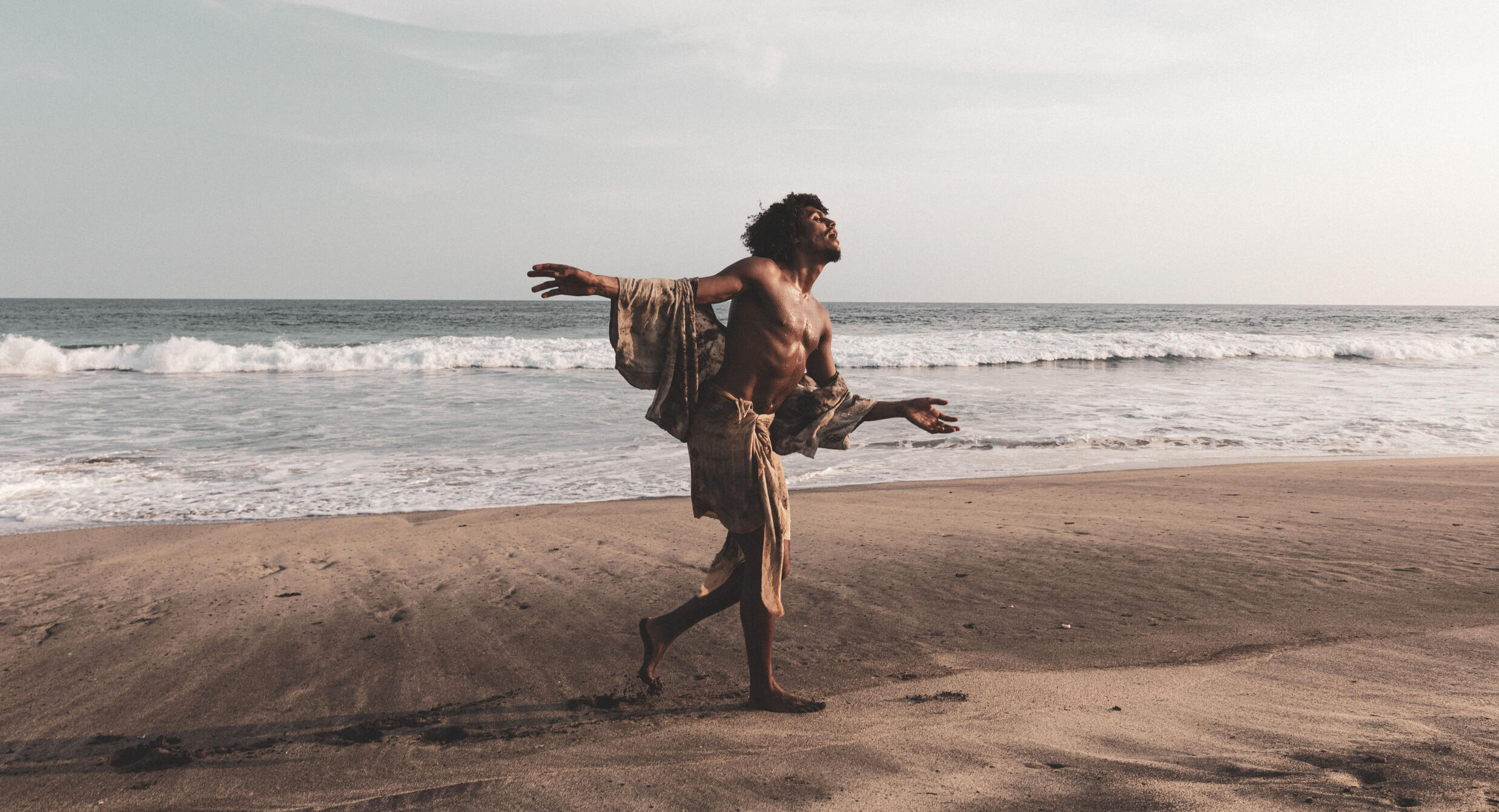 Smiley dancing on the beach